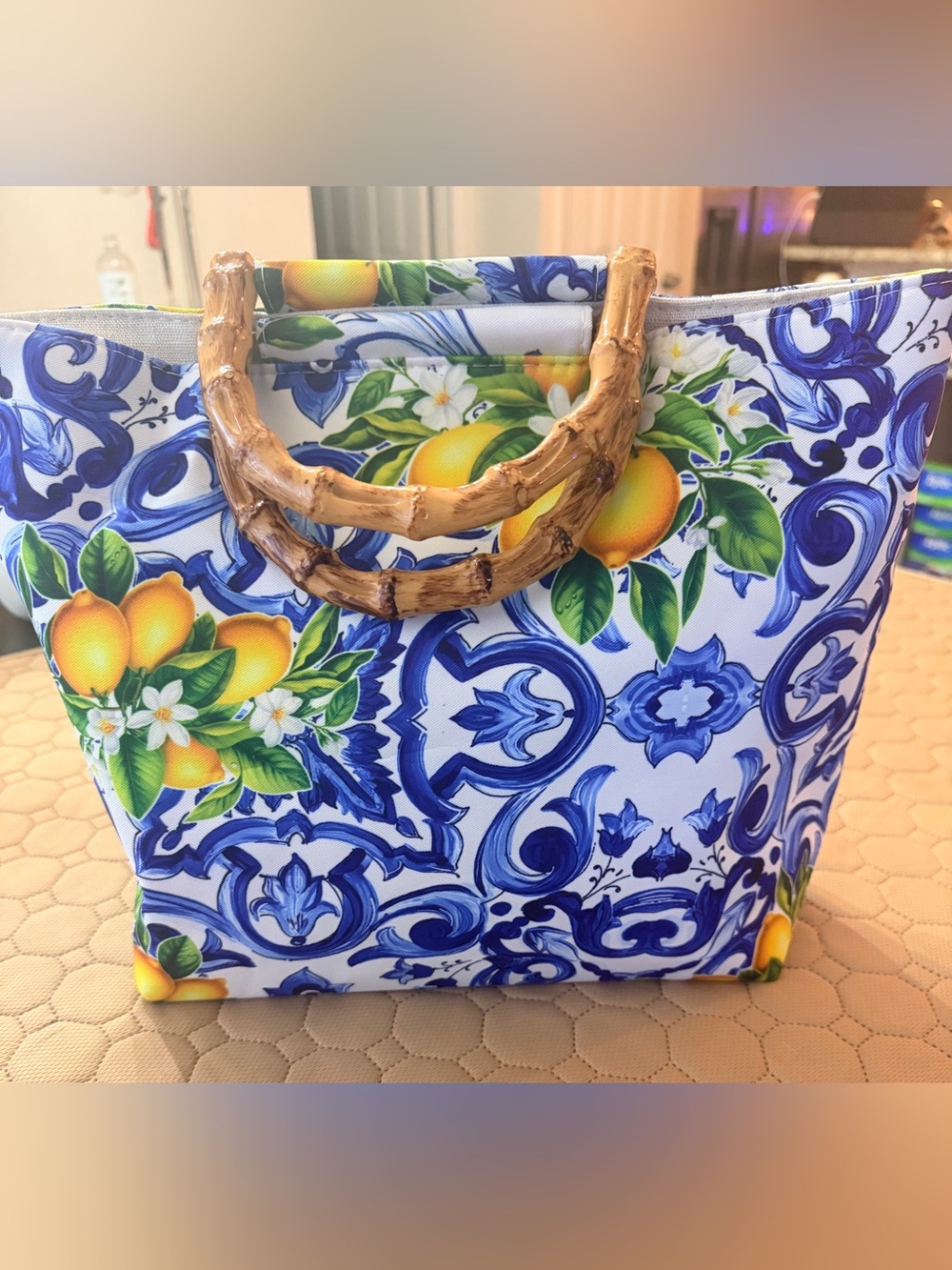 NIP Lemon & blue tile print canvas
tote with Two bamboo like handles.
Gorgeous - Picture 4 of 11